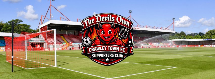 Pitch at Crawley Town FC's home ground on matchday, viewed from the stands